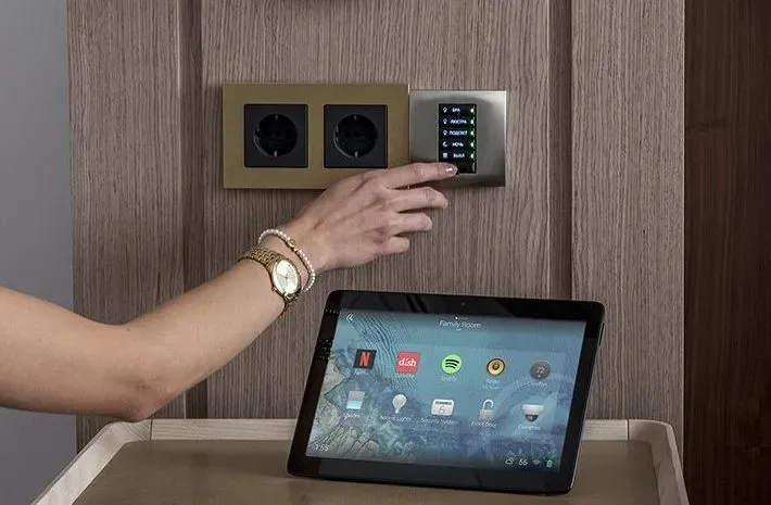 Wall keypad, ordinary switches and a separate control tablet next to each other